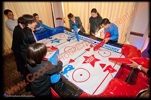 inflatable hose hockey game